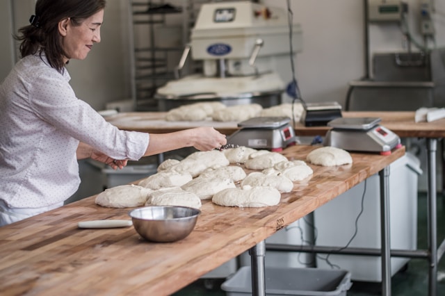 a woman baking bread