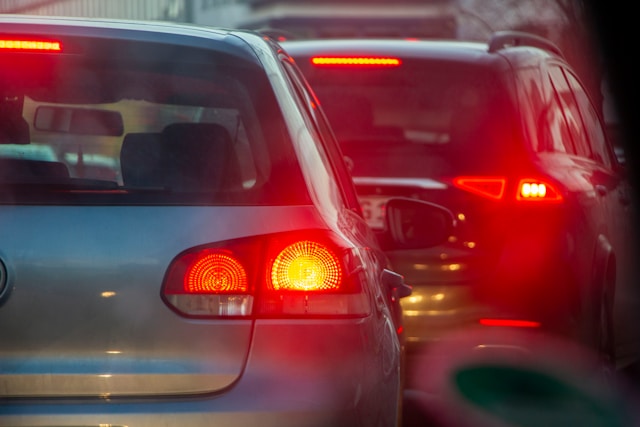 cars waiting at traffic lights