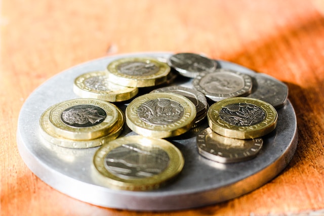 coins on a round tray