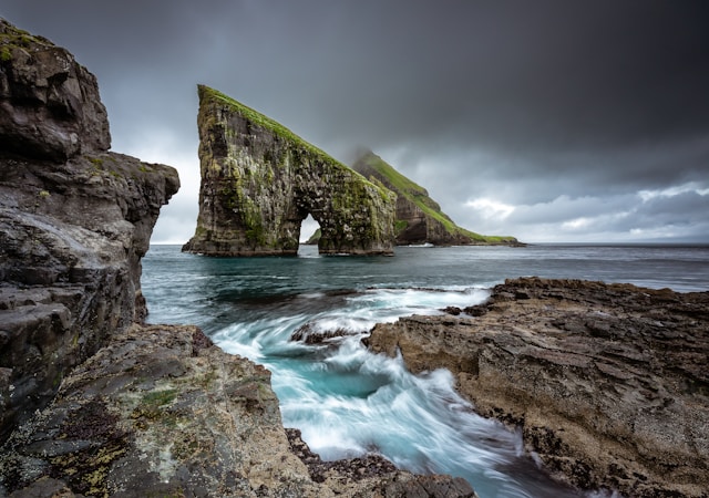 Rock formation on body of water